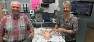 Colin and Lois Pritchard with  SuperTory, the new neonatal patient simulator  in the Pritchard Simulation Centre.